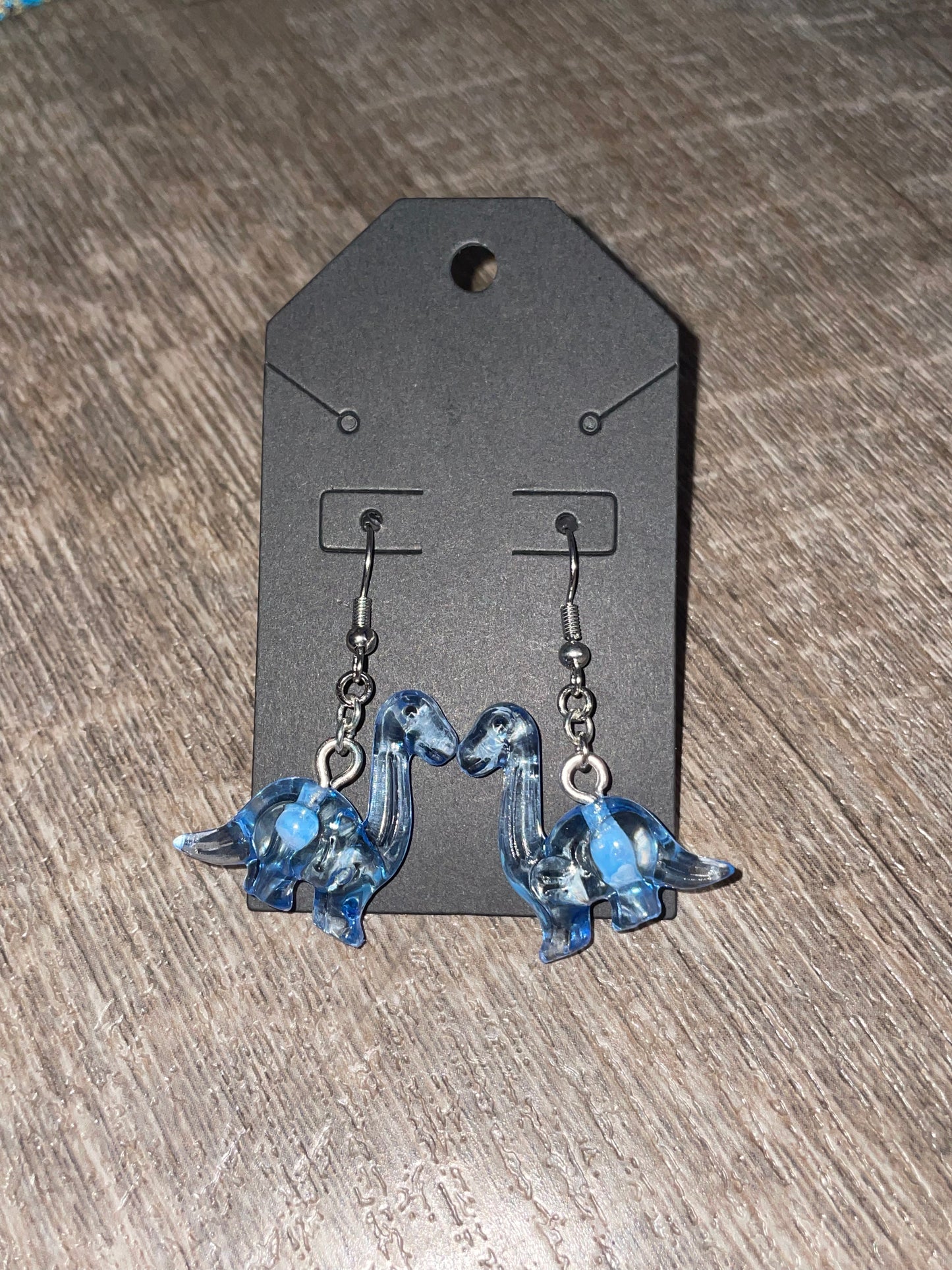 Dinosaur dangle earrings