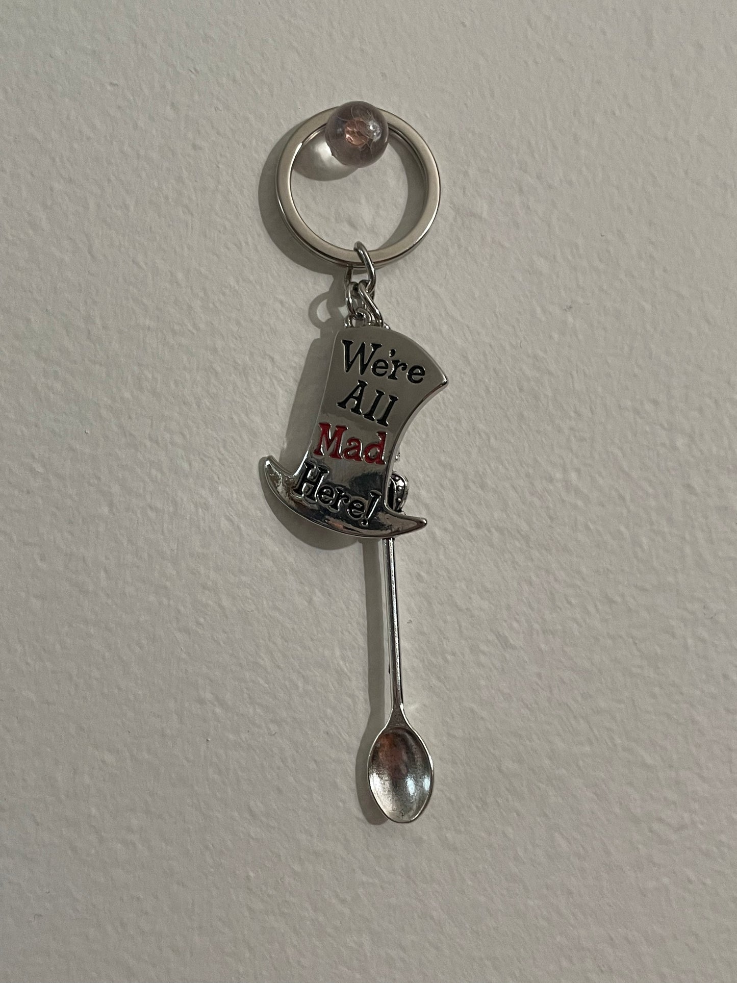 We’re all mad here royal spoon keychain